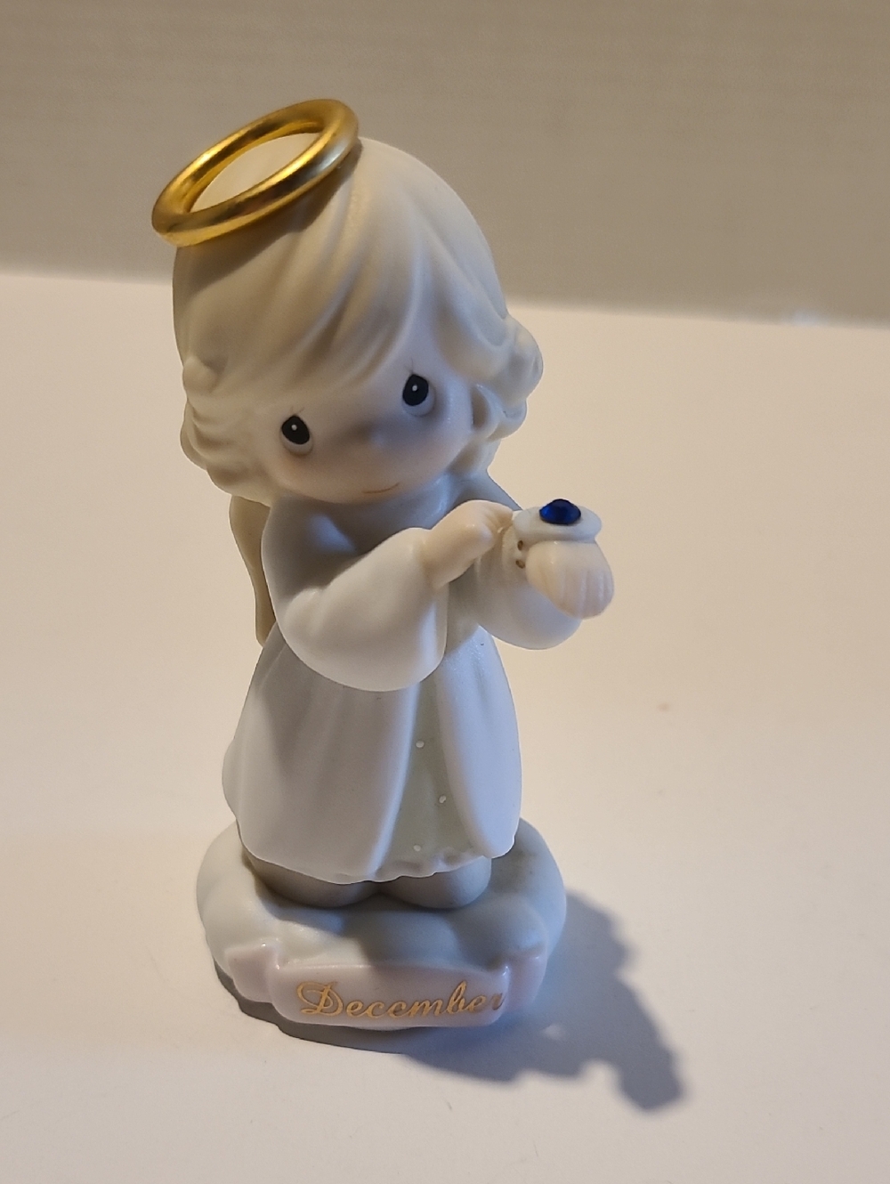 Precious Moments December Angel Figurine in White and Gold with Blue Accent
